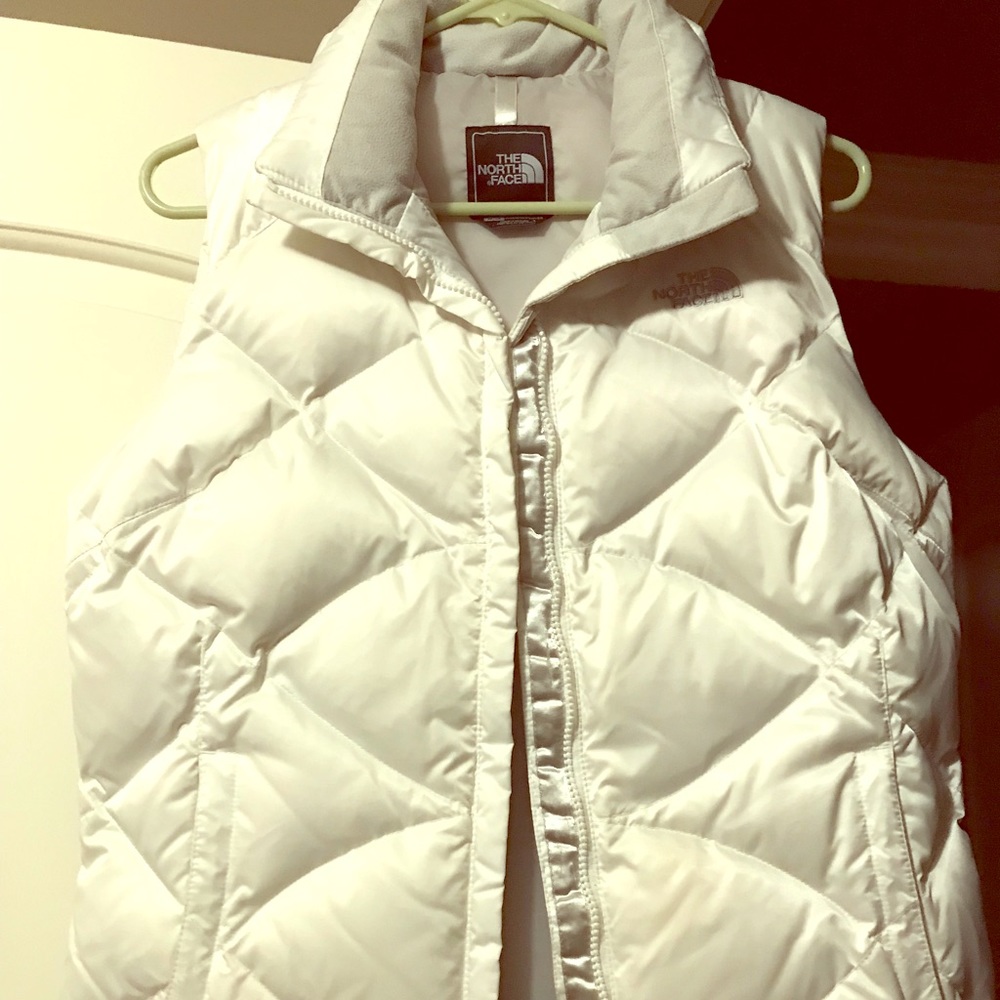 Women’s down north face puffer vest.